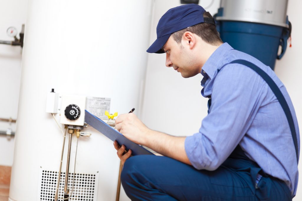 tech troubleshooting water heater